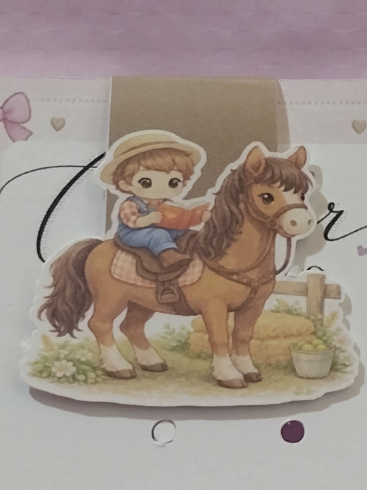 Boy riding horse magnetic Bookmark