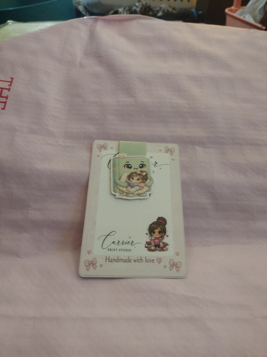 Book holding girl reading, magnetic bookmark