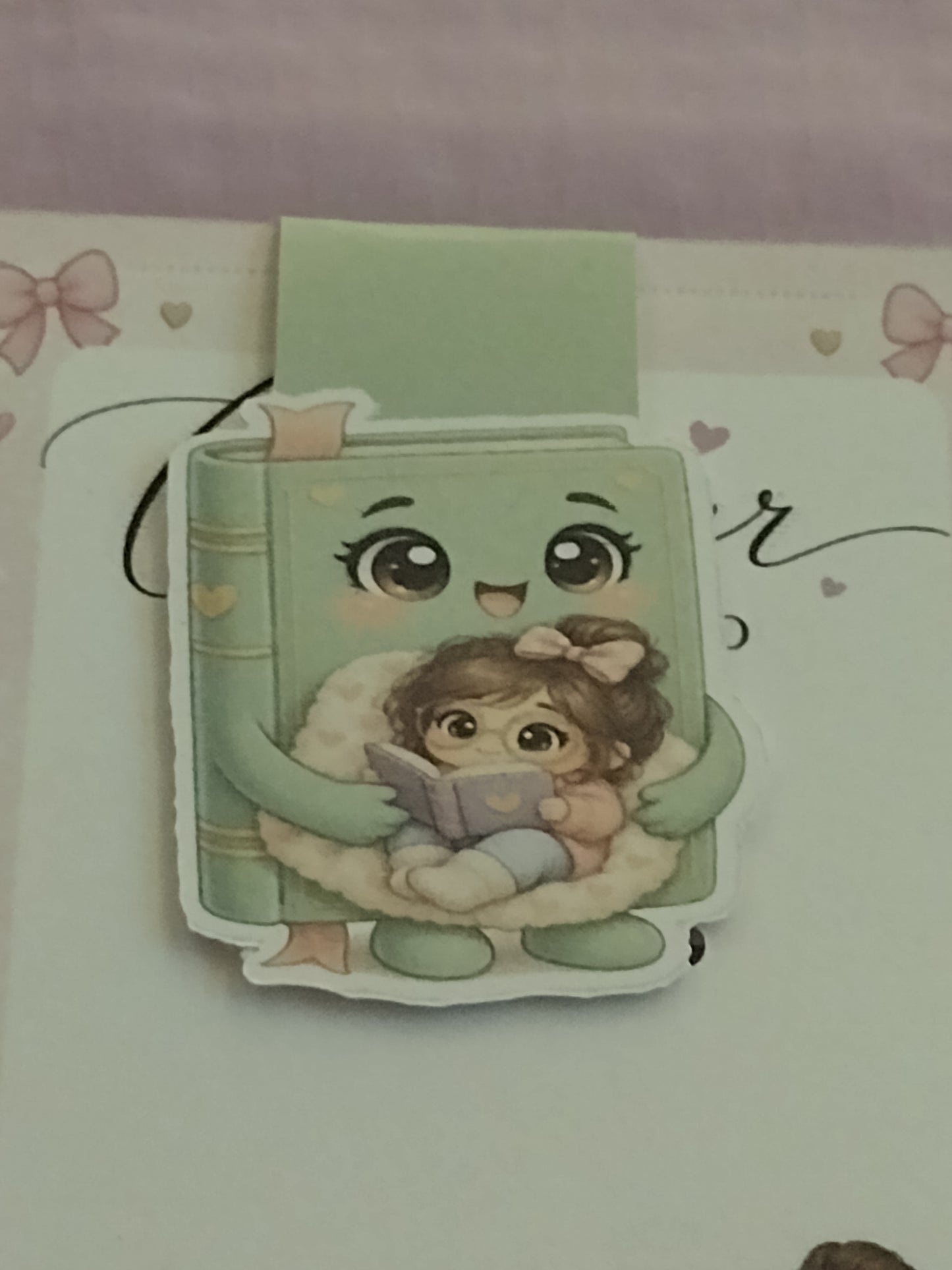 Book holding girl reading, magnetic bookmark